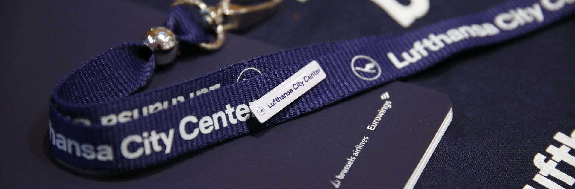 lanyard and pin with lcc branding