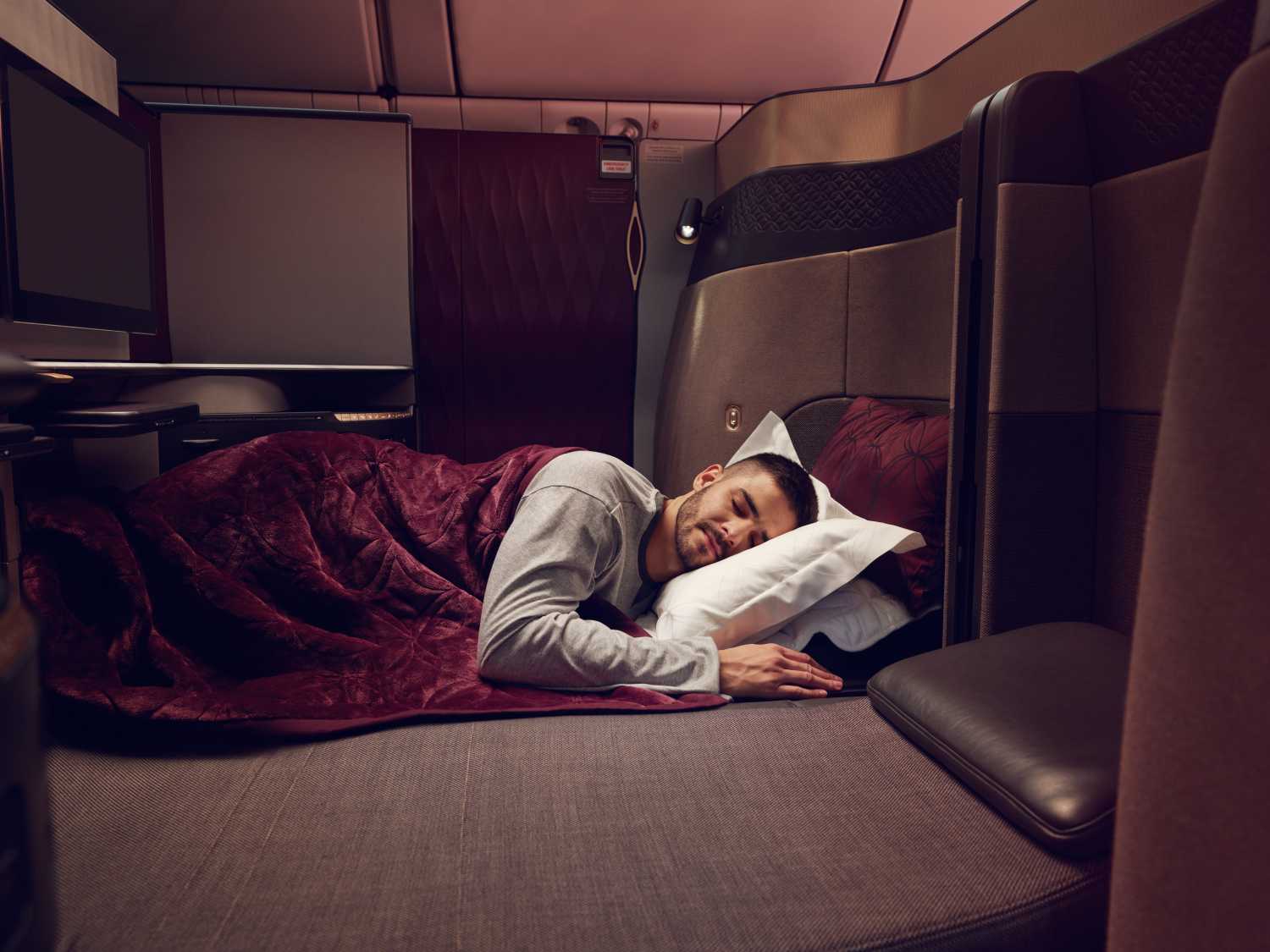 Qsuite Qatar Airways lie flat bed
